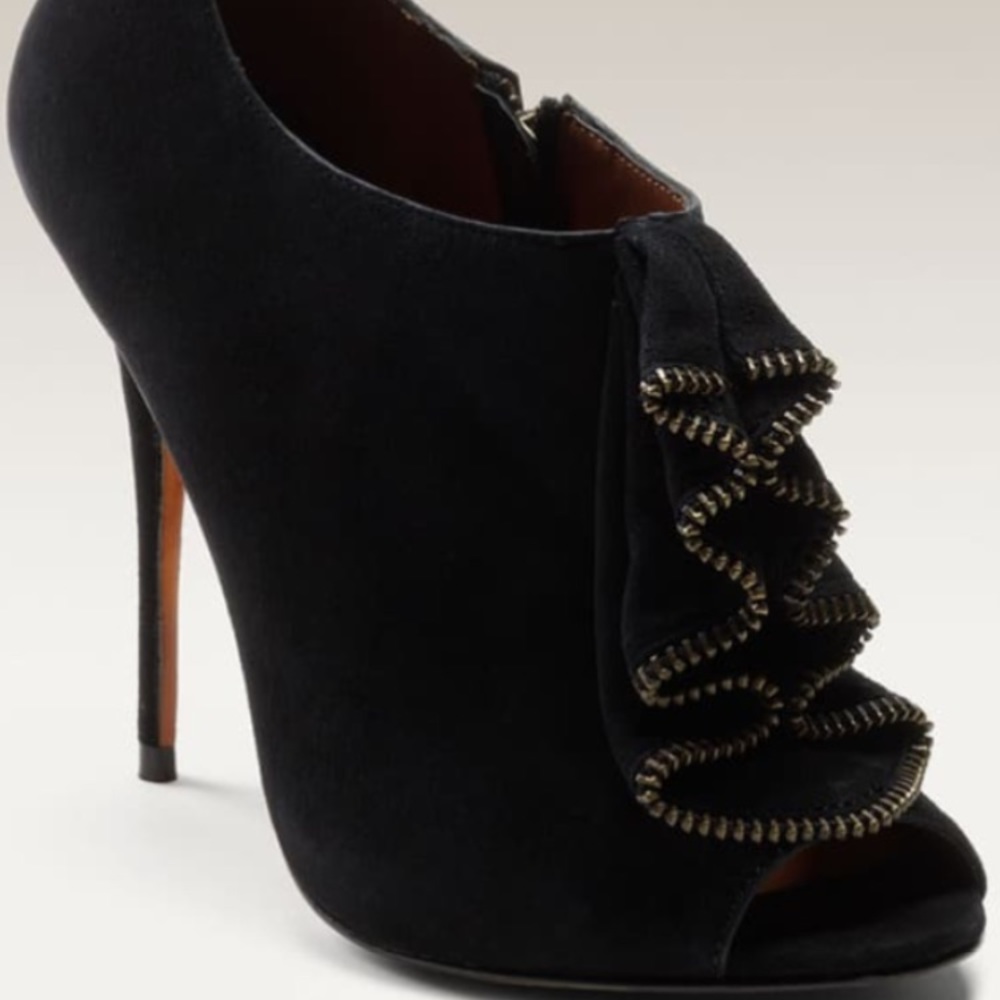 Elizabeth and James suede open-toed booties.